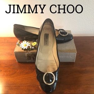 Well-loved Jimmy Choo flats size 10